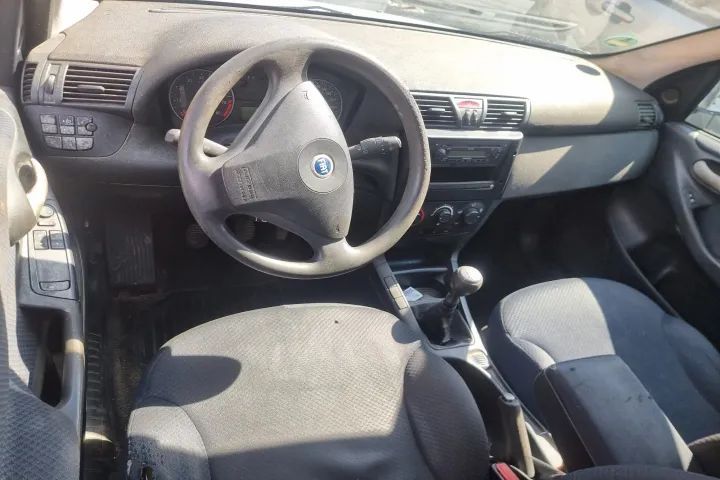 capota bara fata spate armatura grila far stanga dreapta haion portbagaj plansa bord caseta de directie motoras stergatoare chit pornire  broasca stanga dreapta fata spate  Fiat Stilo motor 1.6 benzina 182B6000   dezmembrez