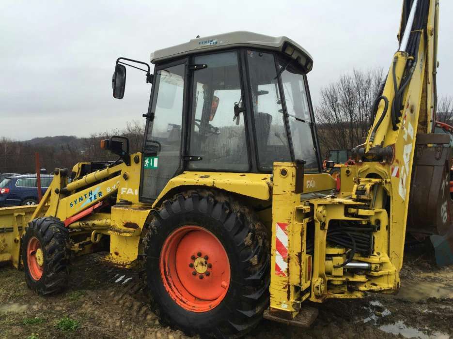 dezmembrez buldoexcavator fai komatsu 898