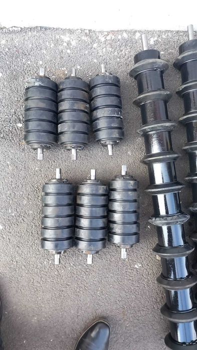 Role metalice sau cauciucate pentru transportoare. Producator