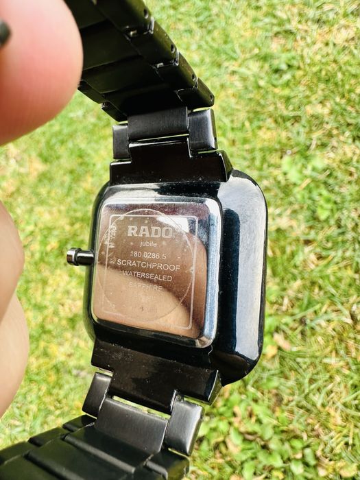 Rado True Square watch featuring a white dial