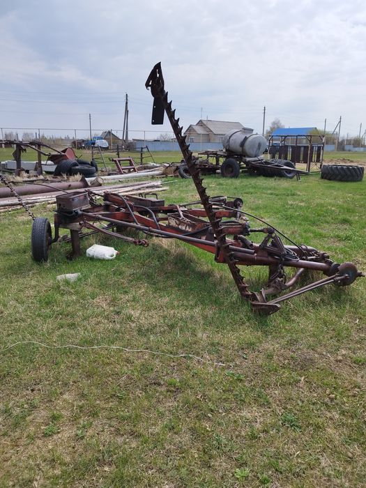 Продам косилку с граблями.
