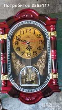 Часовник за стена с въртящ се механизъм