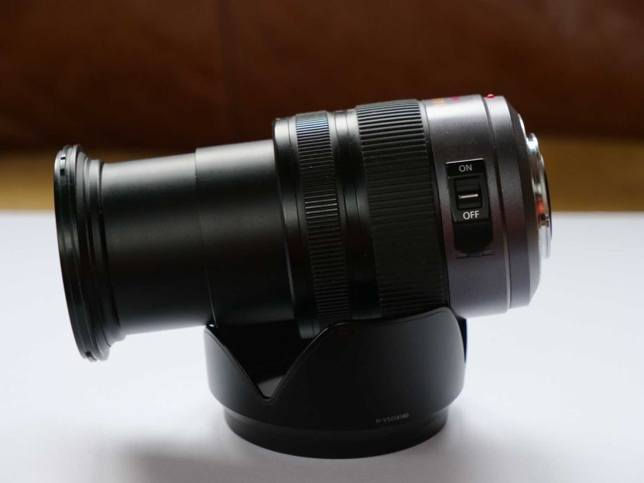 Olympus BLS-5  Panasonic 14-140mm F4-5.8  Deity