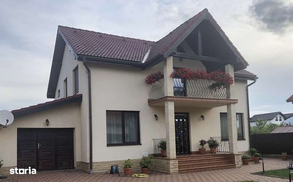 Casa individuală cu garaj încălzit și curte amenajată