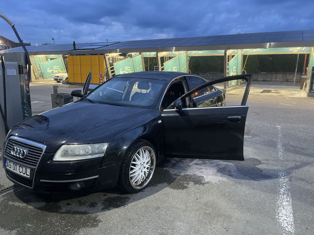Audi a 6 an de fabircatie2005motor3.0 optiuni incalzire ,trapa,muzica