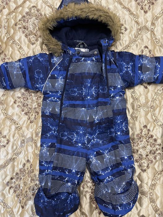 Продам зимний комбинезон Huppa