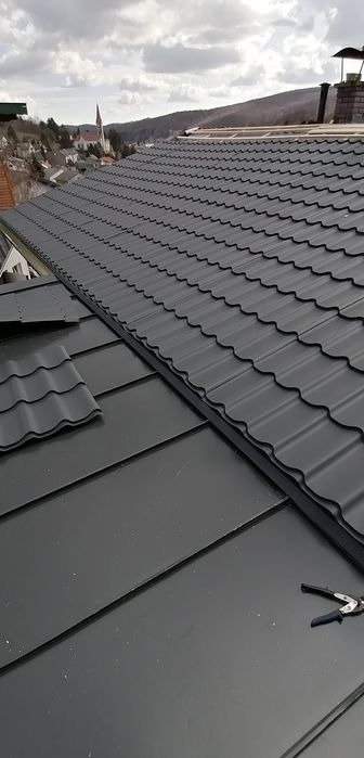 Tigla metalica acoperisuri mansardari jgheaburi burlane reparații