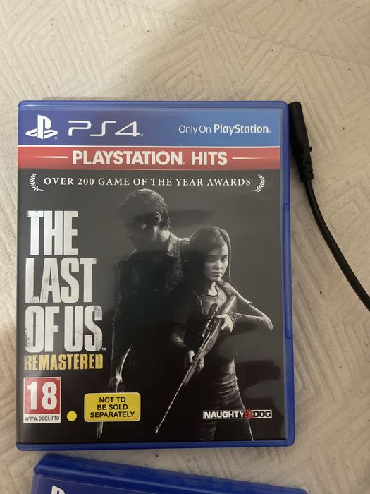 Consola Playstation 4 cu un controller la pachet cu 6 jocuri
