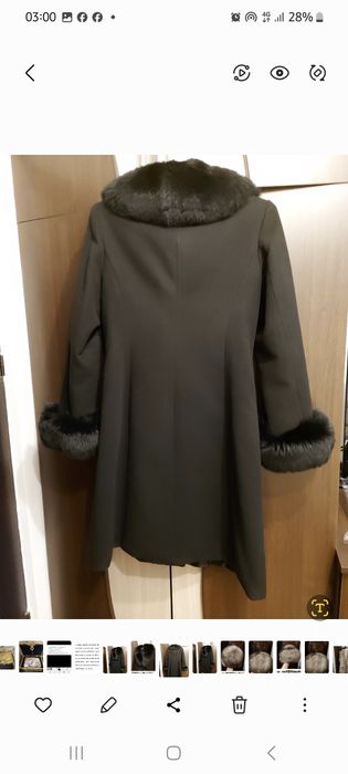 Vând haina din stofa neagra