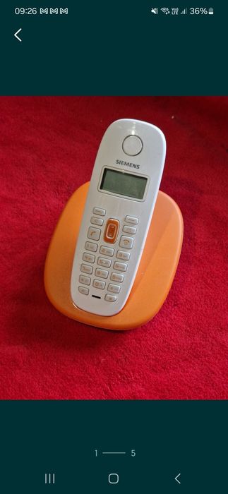 Telefon fix cu probleme la baza de încărcare