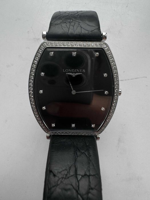 Продам бриллиантовые Швейцарские часы мужской