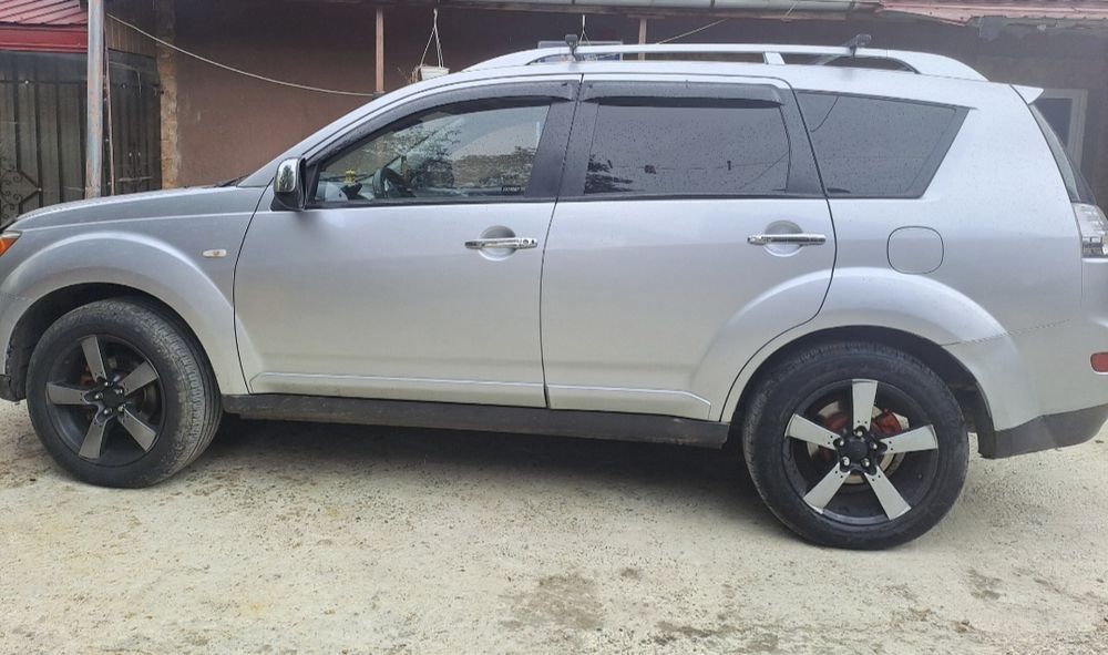 Vand Mitsubishi Outlander 2