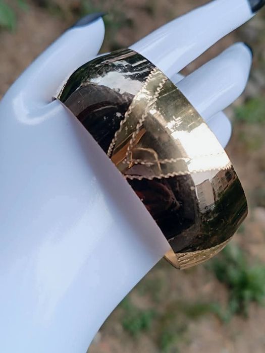 Veche bratara fixa de alama