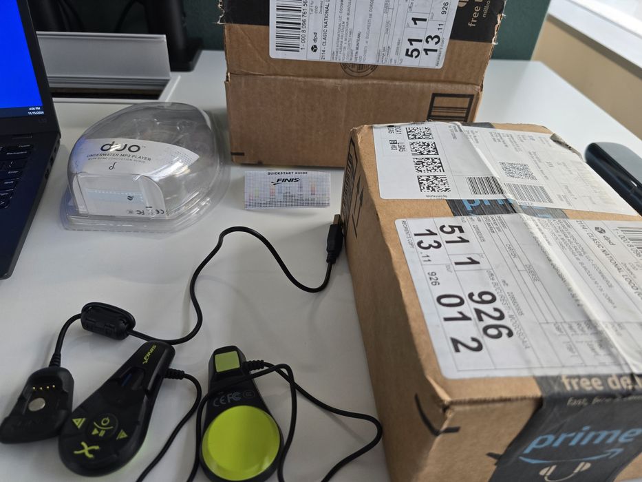 Casti waterproof inot Finis MP3 Player