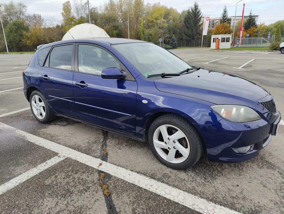 Mazda 3 1.6 benzina 2005 folie geamuri doua seturi de anvelope