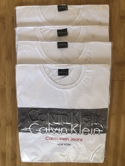 Tricou  Calvin Klein.Produs nou! Așteptăm comenzile dtra!