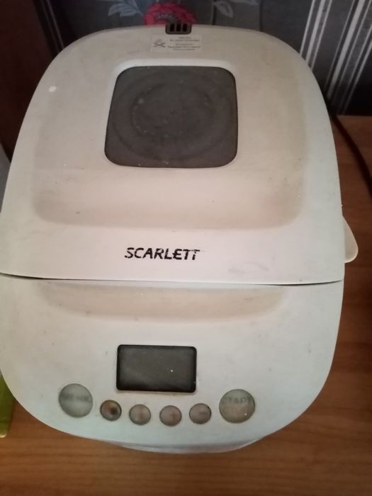 Хлебопечь практически новая