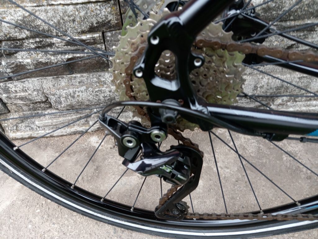 Bicicleta Merida roti pe 28 frâne disc hidraulice import Germania
