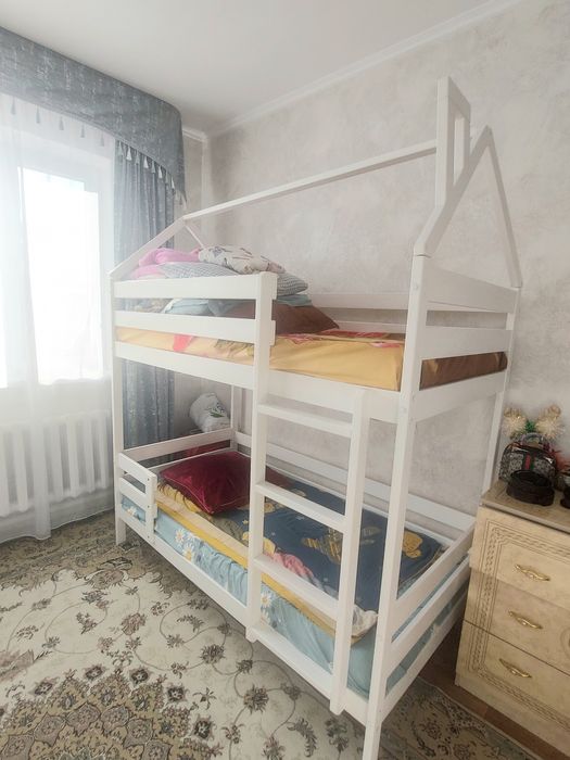 Двухярусная детская кровать