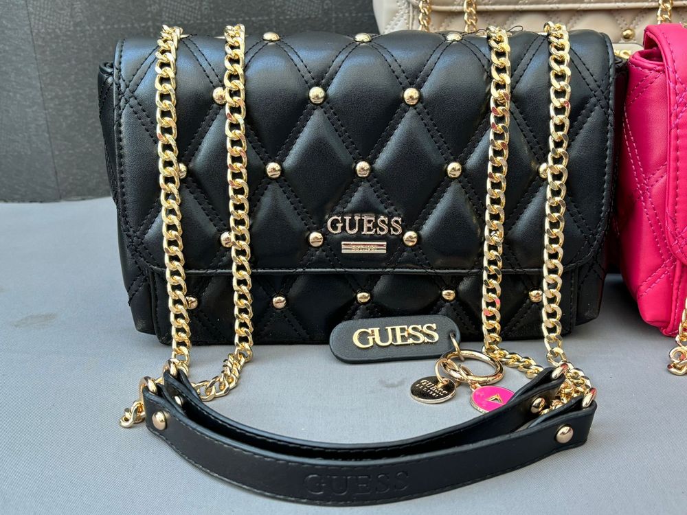 Geanta Michael Kors si Guess