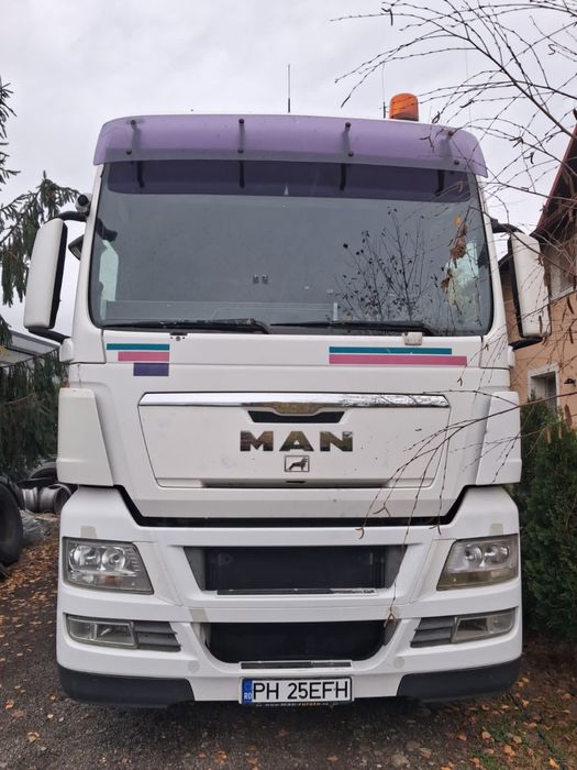 MAN TGX 18.440+semiremorca schmitz