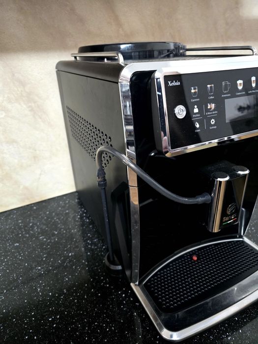 expresor aparat cafea Saeco Xelsis garanție