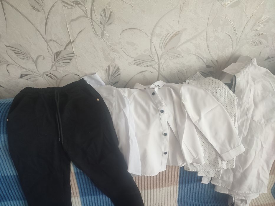 Продам рубашки брюки весенняя куртка