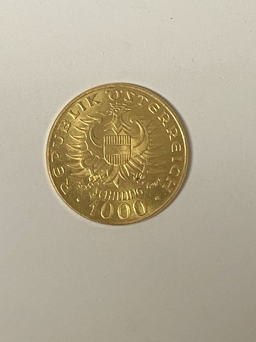 Vand moneda aur 1000 schilingi