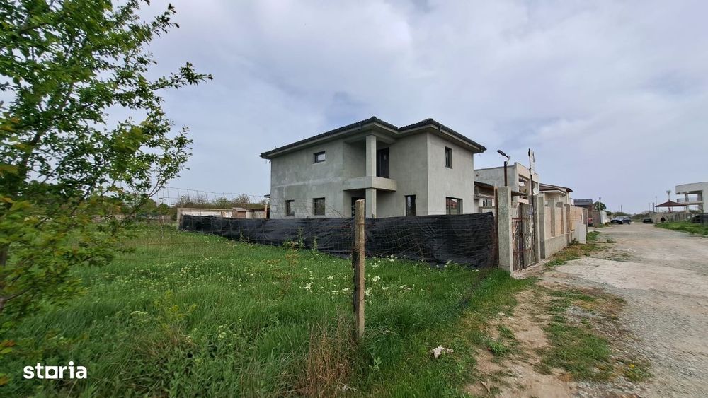 Km.5, En-Gros teren 353 mp. deschidere 12.40 m intravilan, intre vile