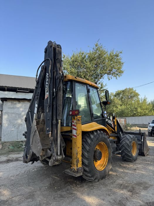 МСТ , MST  542 Plus Эксковатор-погрузчик