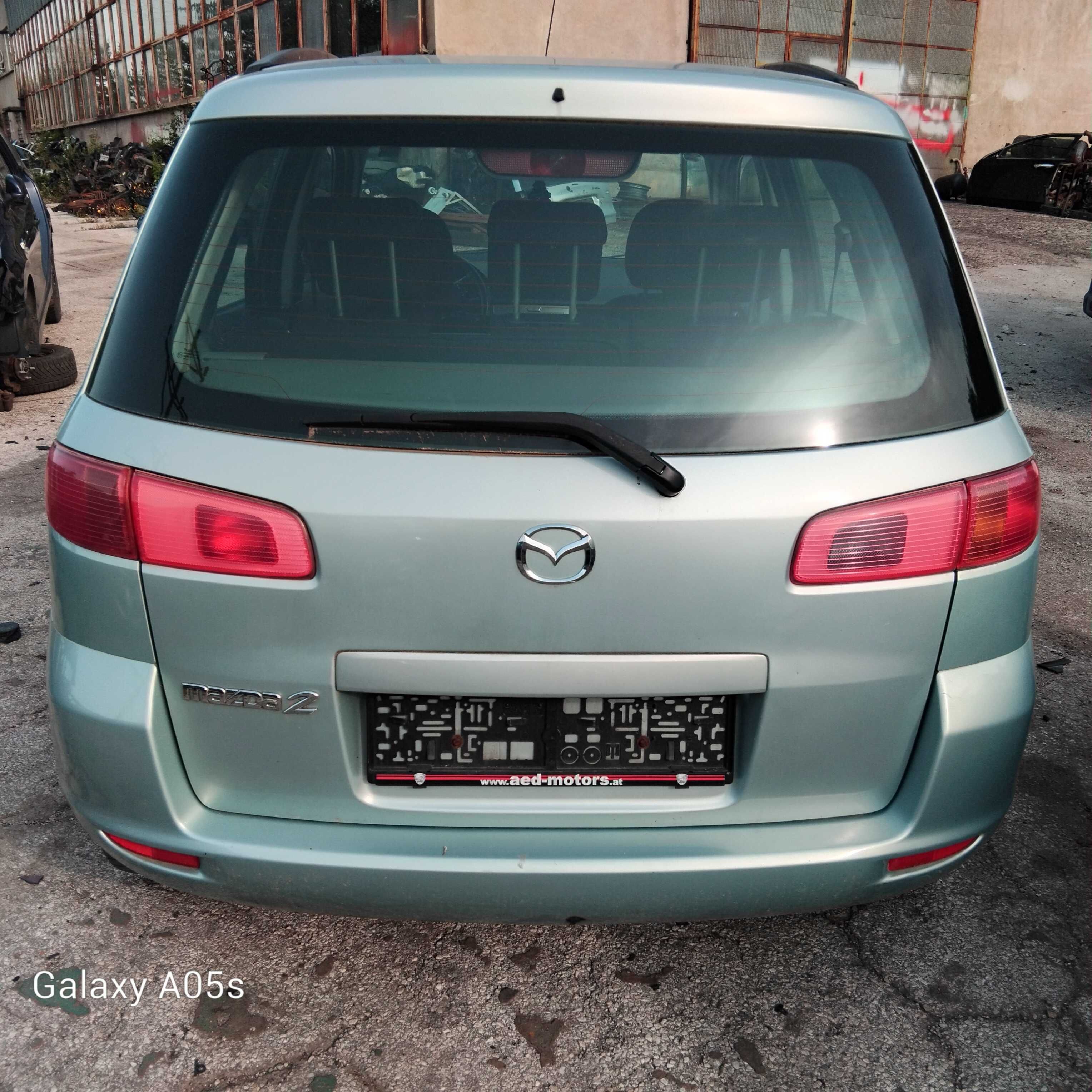 Mazda 2  1.2i 75 к.с. на части 2004г.