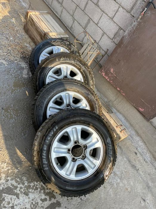 Тойота ландкрузерге титановый диск зимни  покрышкасымен