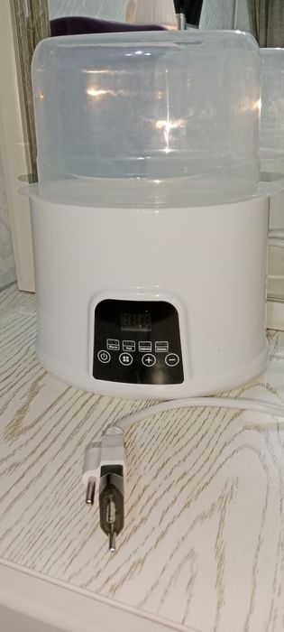 Chaqaloqlarning ovqat va sut isitgichi bug sterilizatori