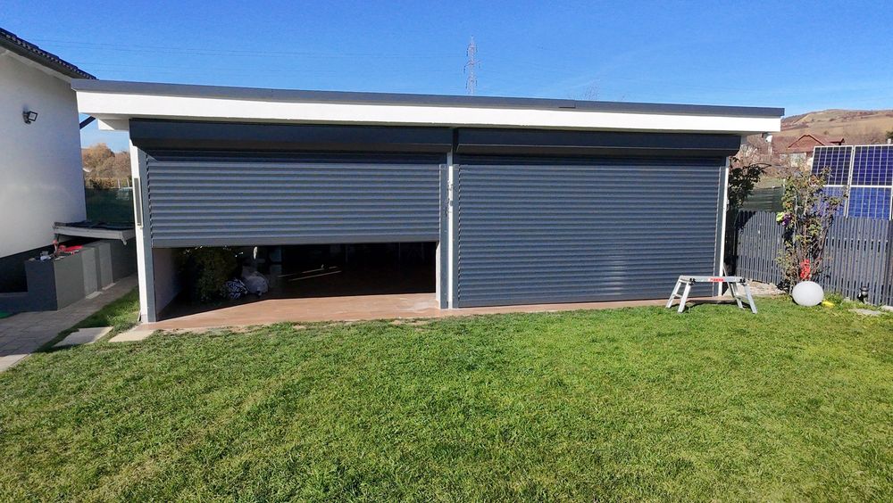 Rulouri exterioare.  Usi de garaj tip rulou.  Rulouri aluminiu.  Usii