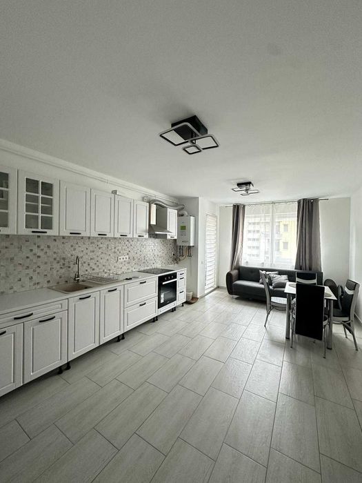 Închiriez ap. 2 camere, parcare subterană, str. Florilor