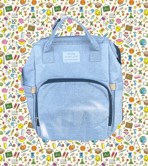 Раница с място за повиване на бебе