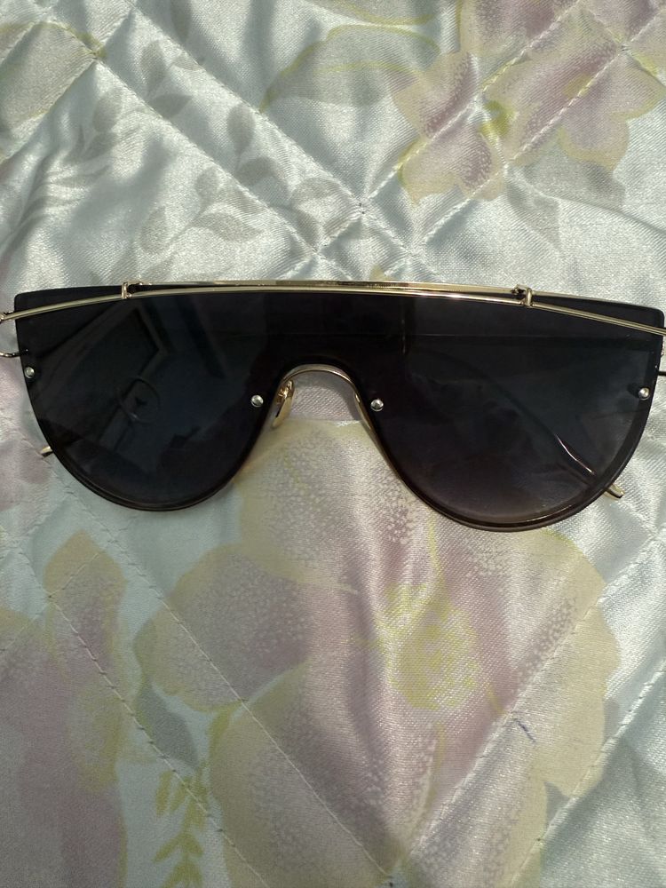 Слънчеви очилa на Guess i Fendi