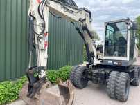 Terex TW70 excavator pe roti compact