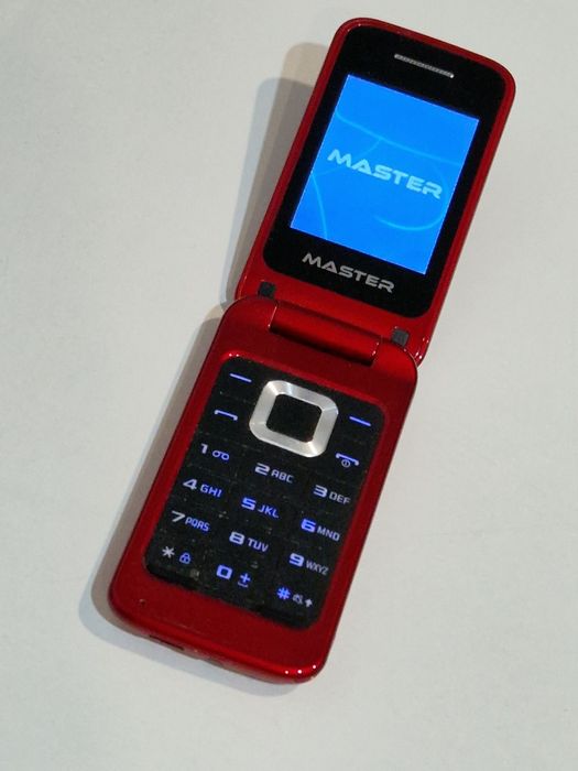 Telefon cu clapeta cu încărcător