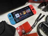 Nintendo Switch OLED с игри и гейминг аксесоари