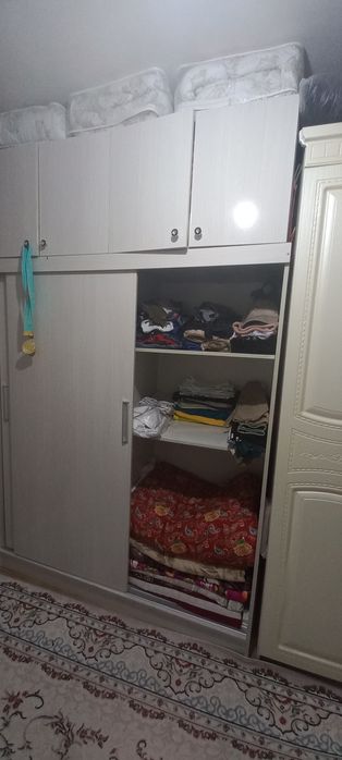 Шкаф көрпе төсек жинайтын