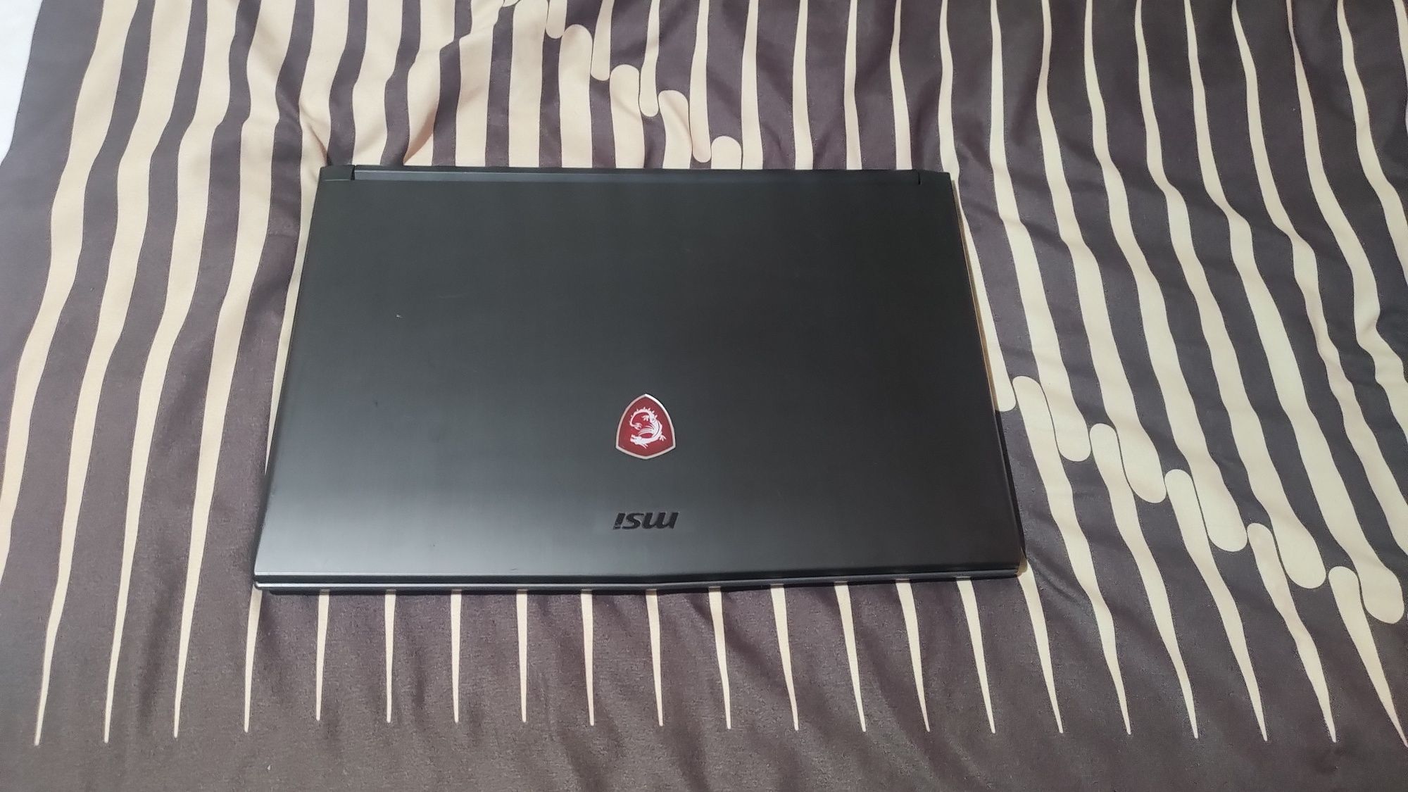 Vând laptop gaming MSI ,i7 8750h,gtx 1060 6g.