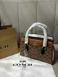Сумка Coach из натуральной кожи и канвы