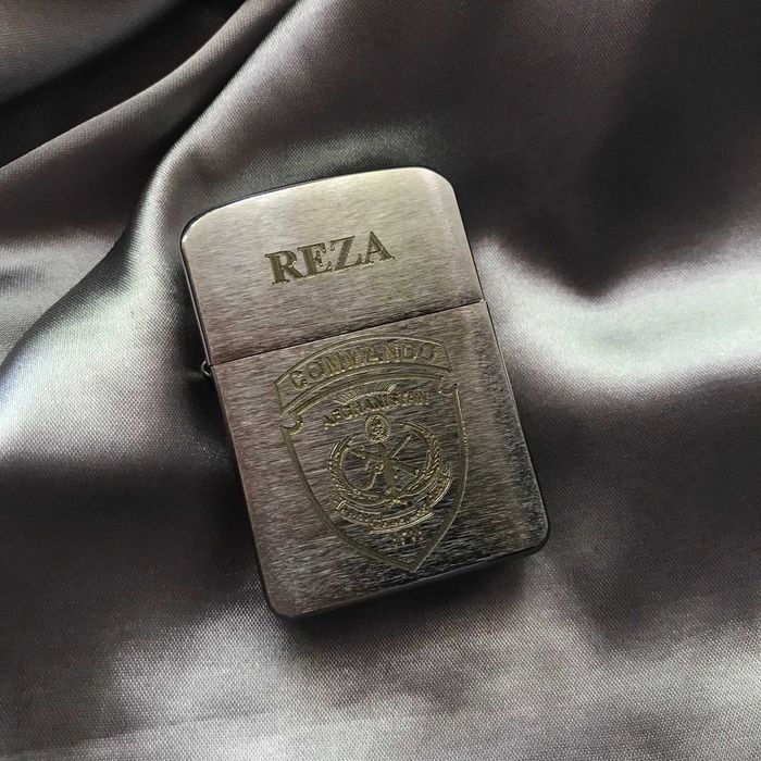 Зажигалка Zippo .