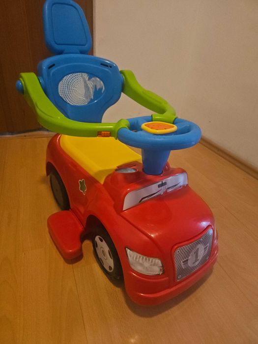Masinuta Ride-On 4 in 1 Dolu Step Car Rosu pentru copii intre 1-3 ani