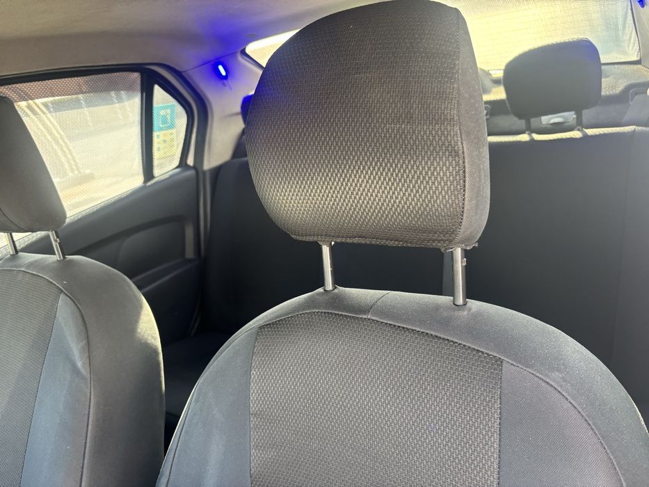 Logan taxi cu loc si firma