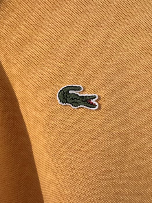 Tricou Lacoste (nu Gant, nu Calvin Klein, nu Ralph Lauren, nu Tommy)