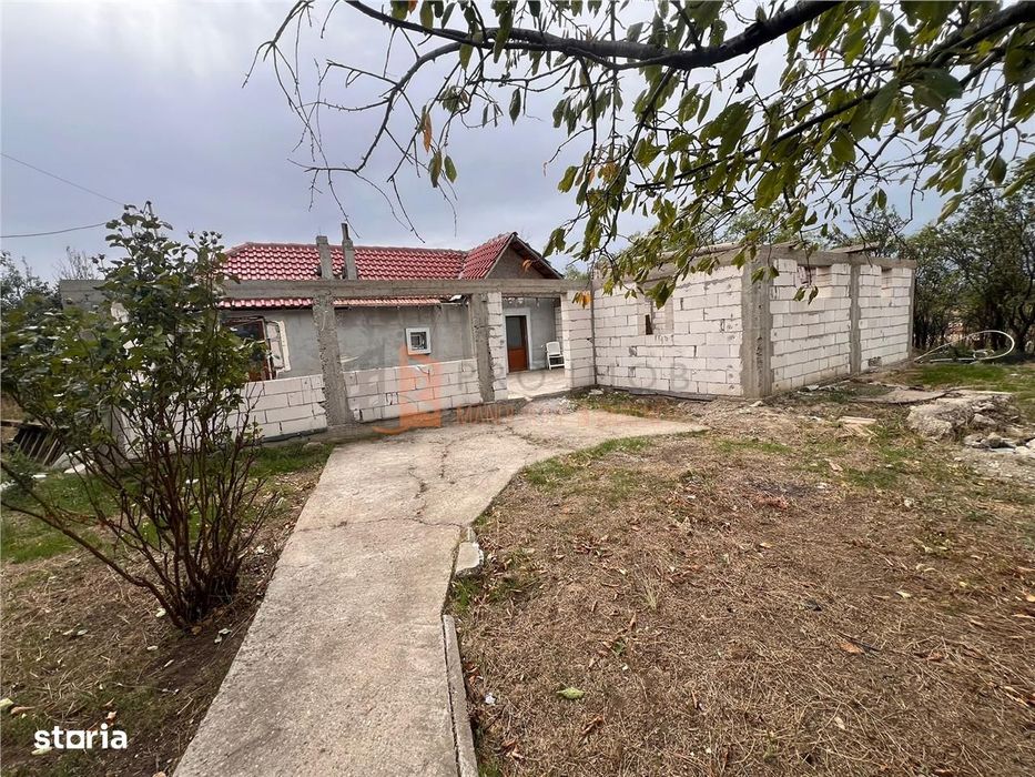 Teren intravilan+casa  zona Posta Calnau