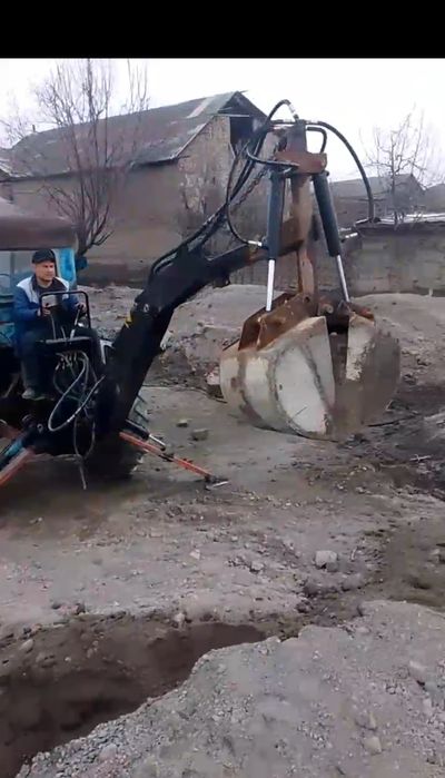 Рачок тракторлага пагрузчик экскаватор  килиб ишлатишка