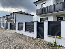 Construim garduri si porti din sipca metalica, panouri stil jaluzele,